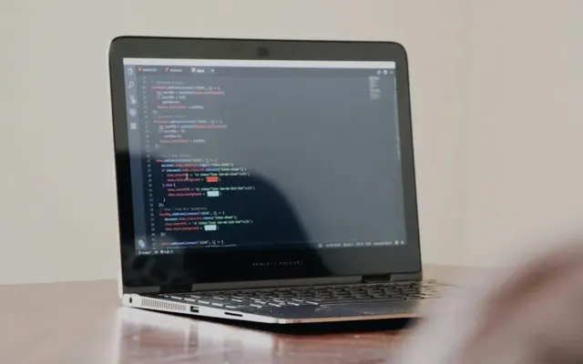 Programming code displayed on a laptop