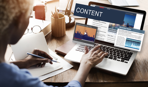 Laptop showing an article page with its headline